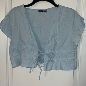 Shein light blue, cropped shirt, size large.